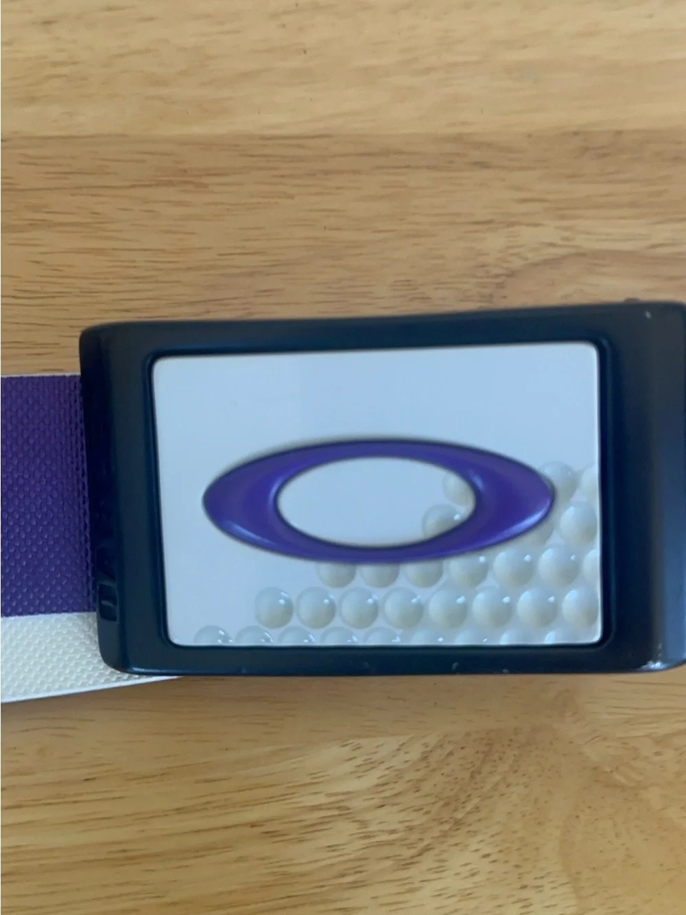 Oakley Belt Buckle with Purple Belt.